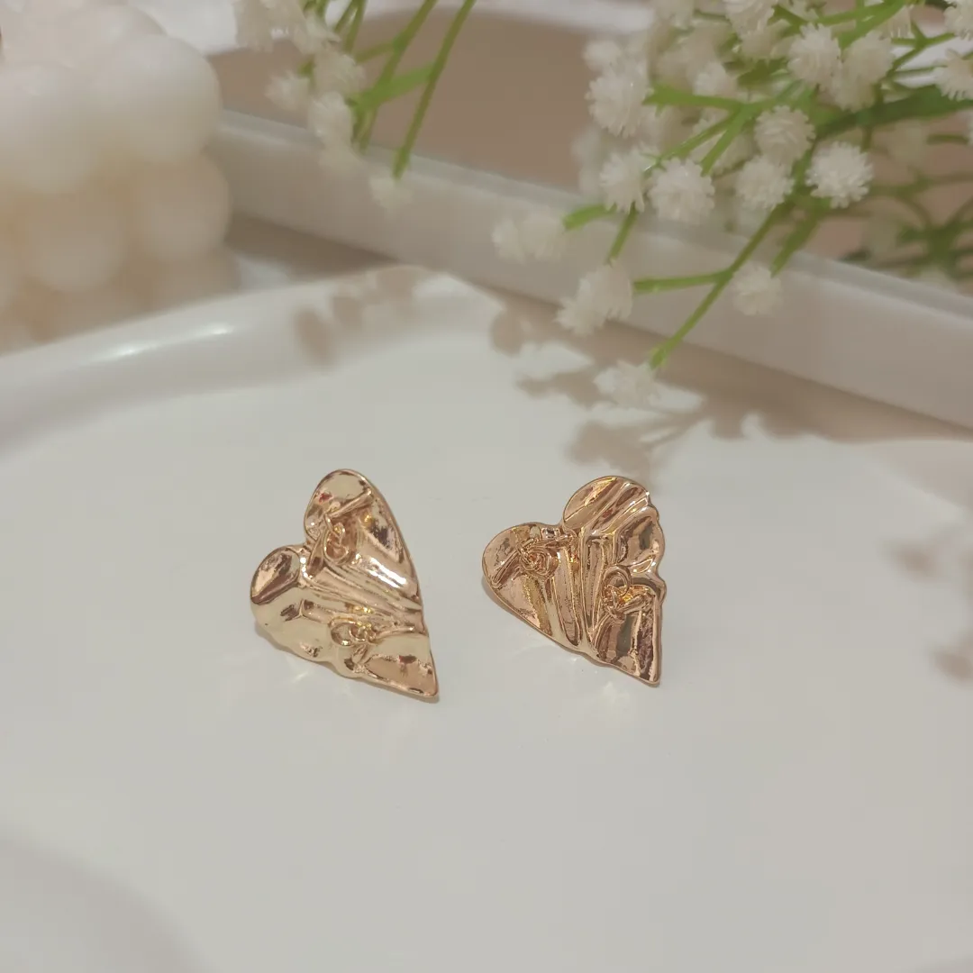 Gold heart-shaped earrings